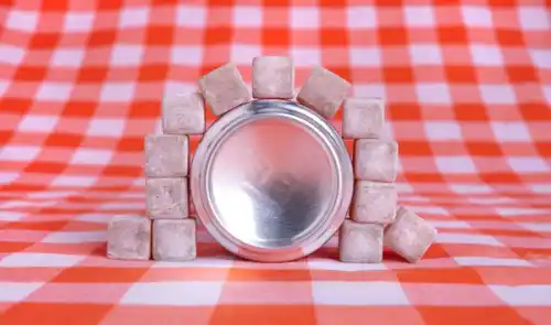 Ground Cherry Cola Delights shot on picnic cloth lined up against a soda can.