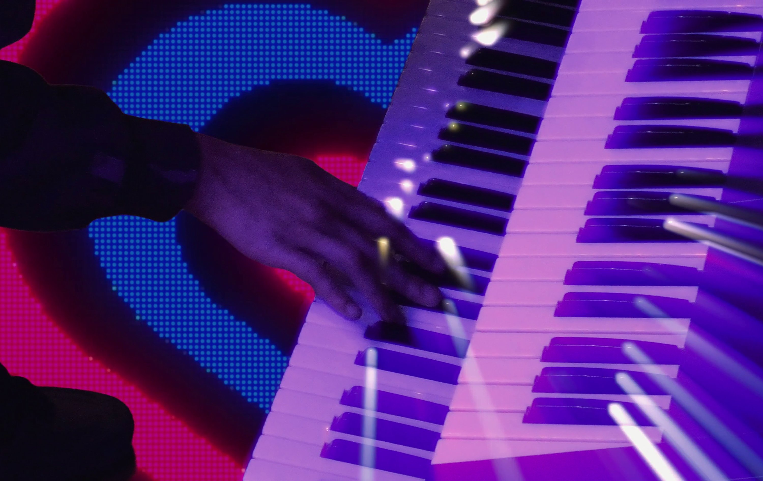 Hands playing the piano
