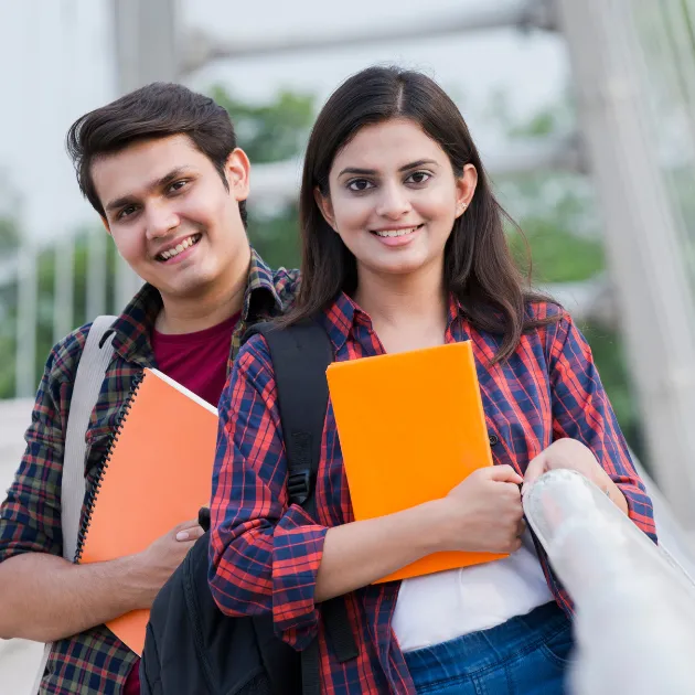 Two happy students posing for a picture somewhere in Australia