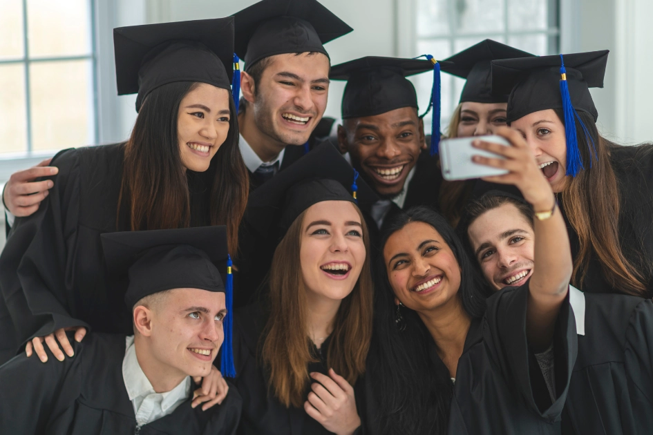 students celebrating graduation