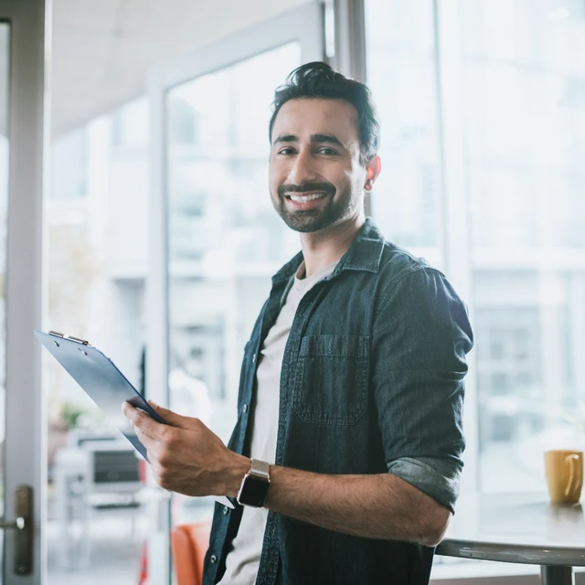 A yound student filling up aform