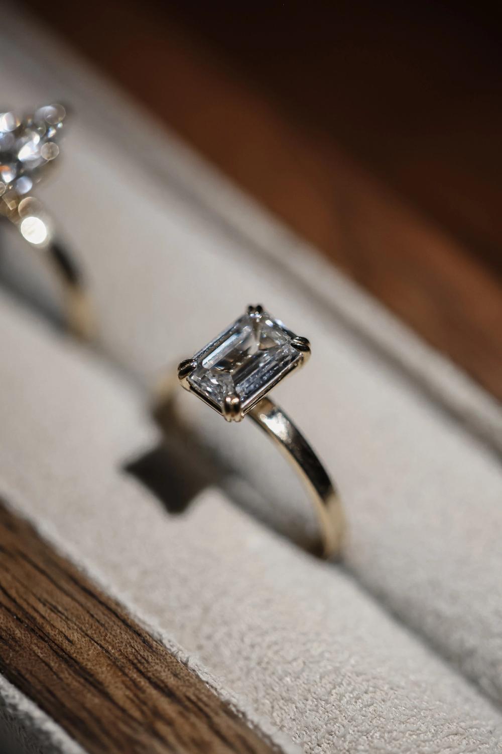 Emerald cut lab-grown diamond set in 14K yellow gold