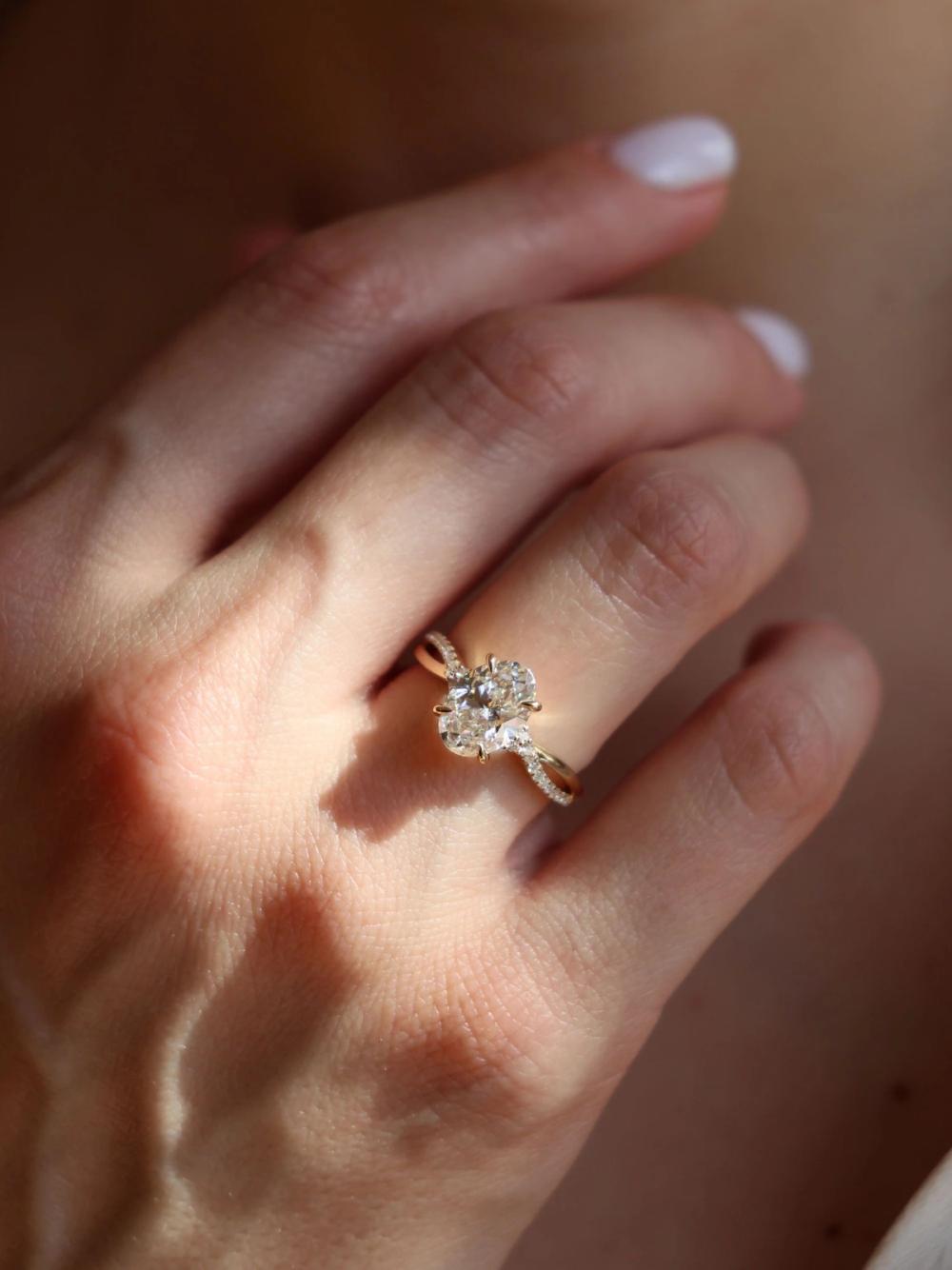 Nangi Custom Lab grown Twisted Swan Oval Diamond Ring in 14K solid gold