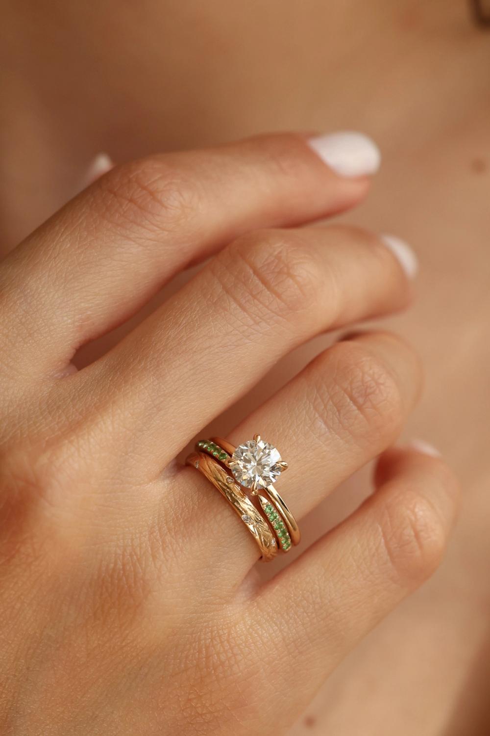 Lab-grown diamond set in yellow gold with wedding band