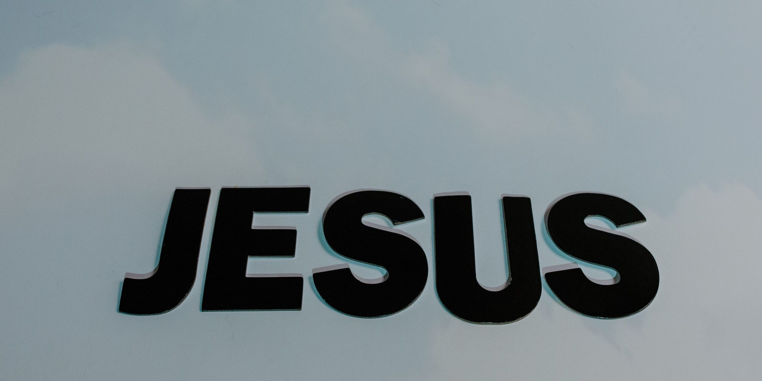 name of Jesus in the clouds