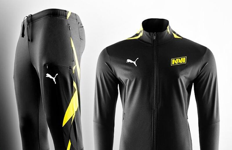 Black Puma NAVI tracksuit with yellow accents.