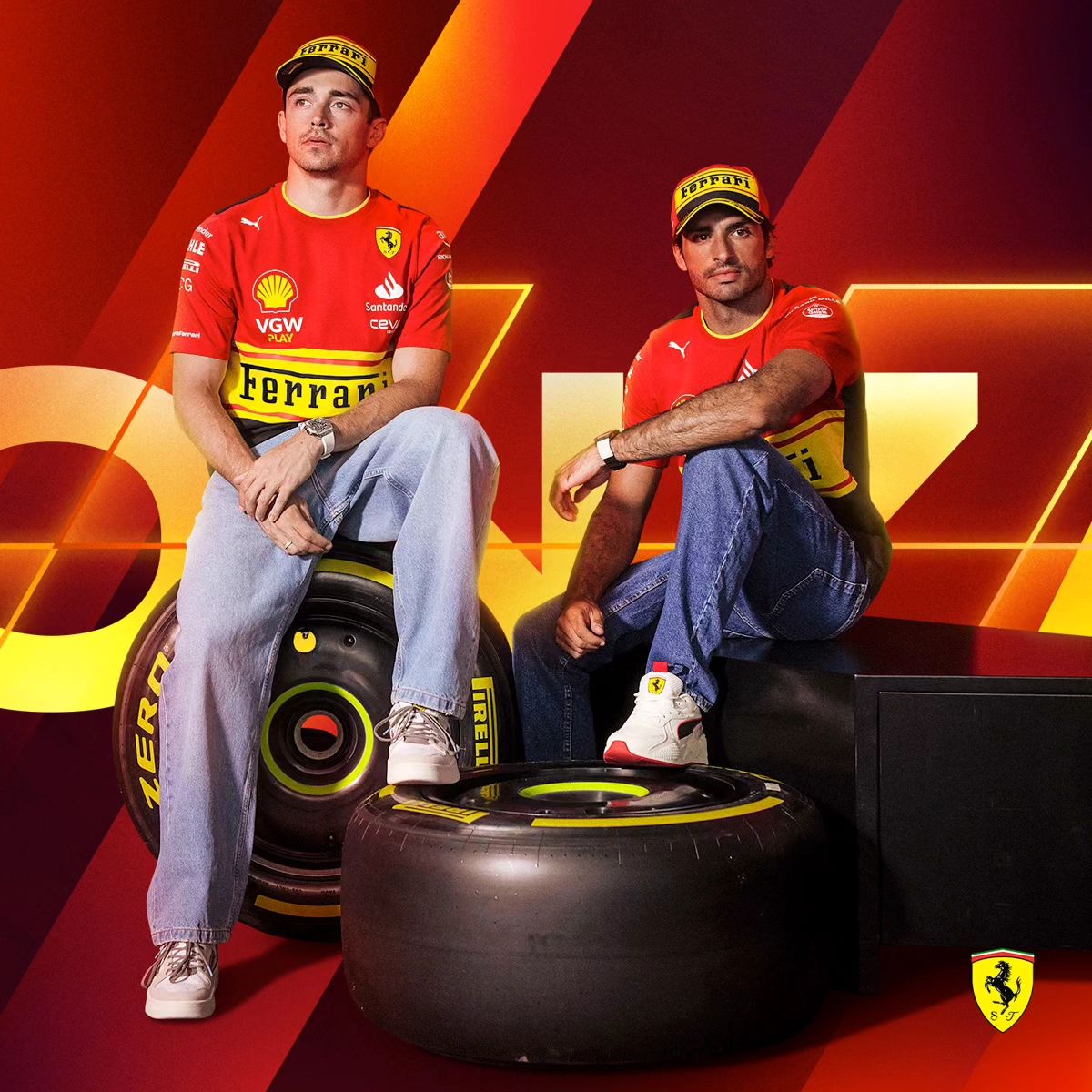 Ferrari F1 drivers Charles Leclerc and Carlos Sainz in team shirts, caps, and jeans, posing with Pirelli tires.