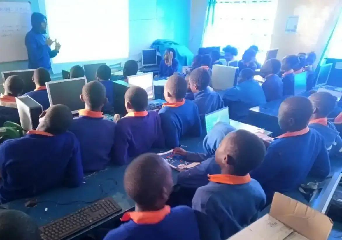 Students taking part in a computer lesson