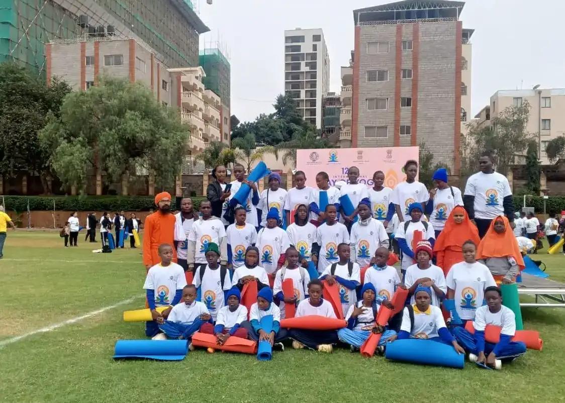 Students and teachers together at a yoga event.