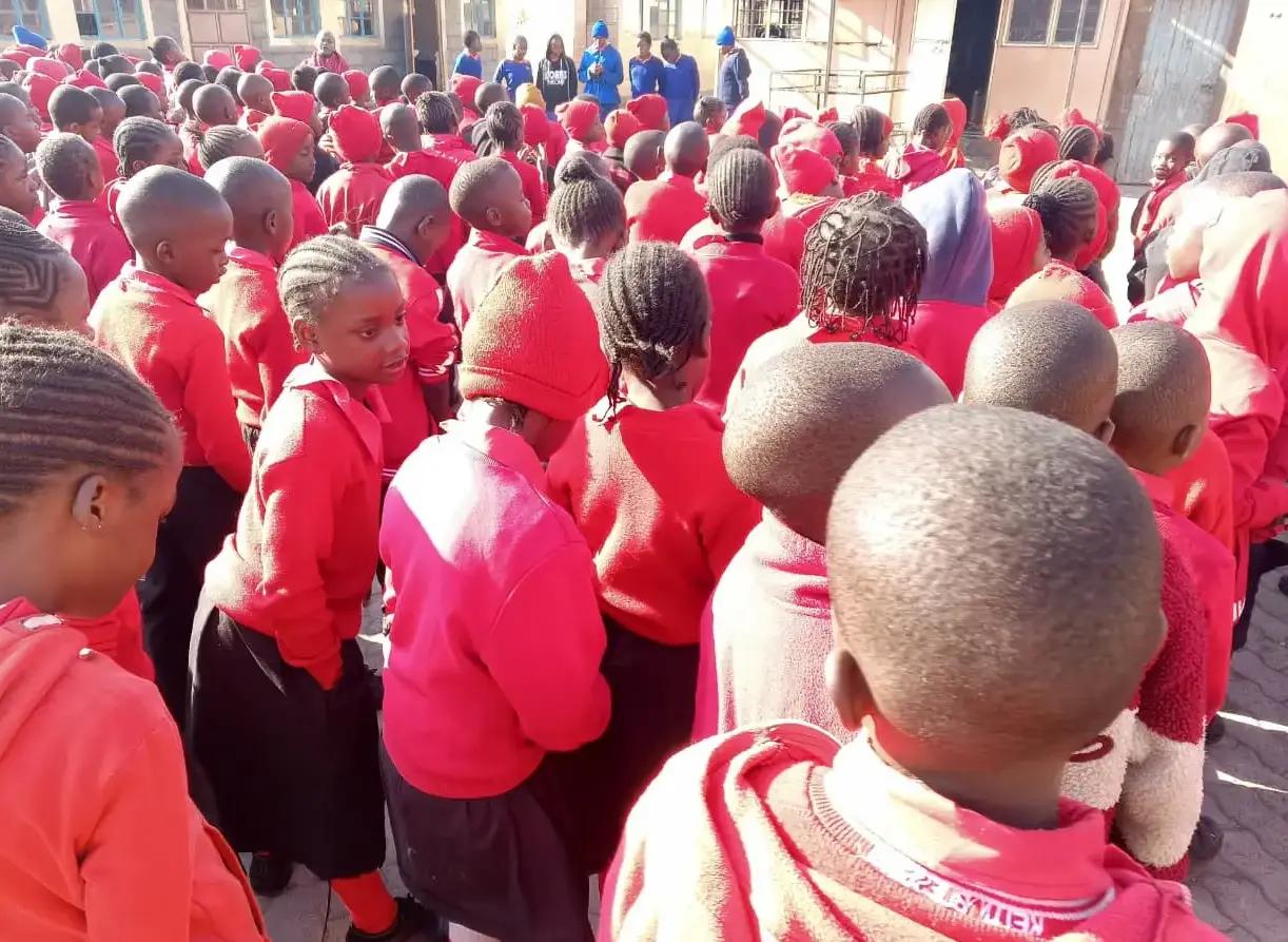 Students lining up together for assembly.
