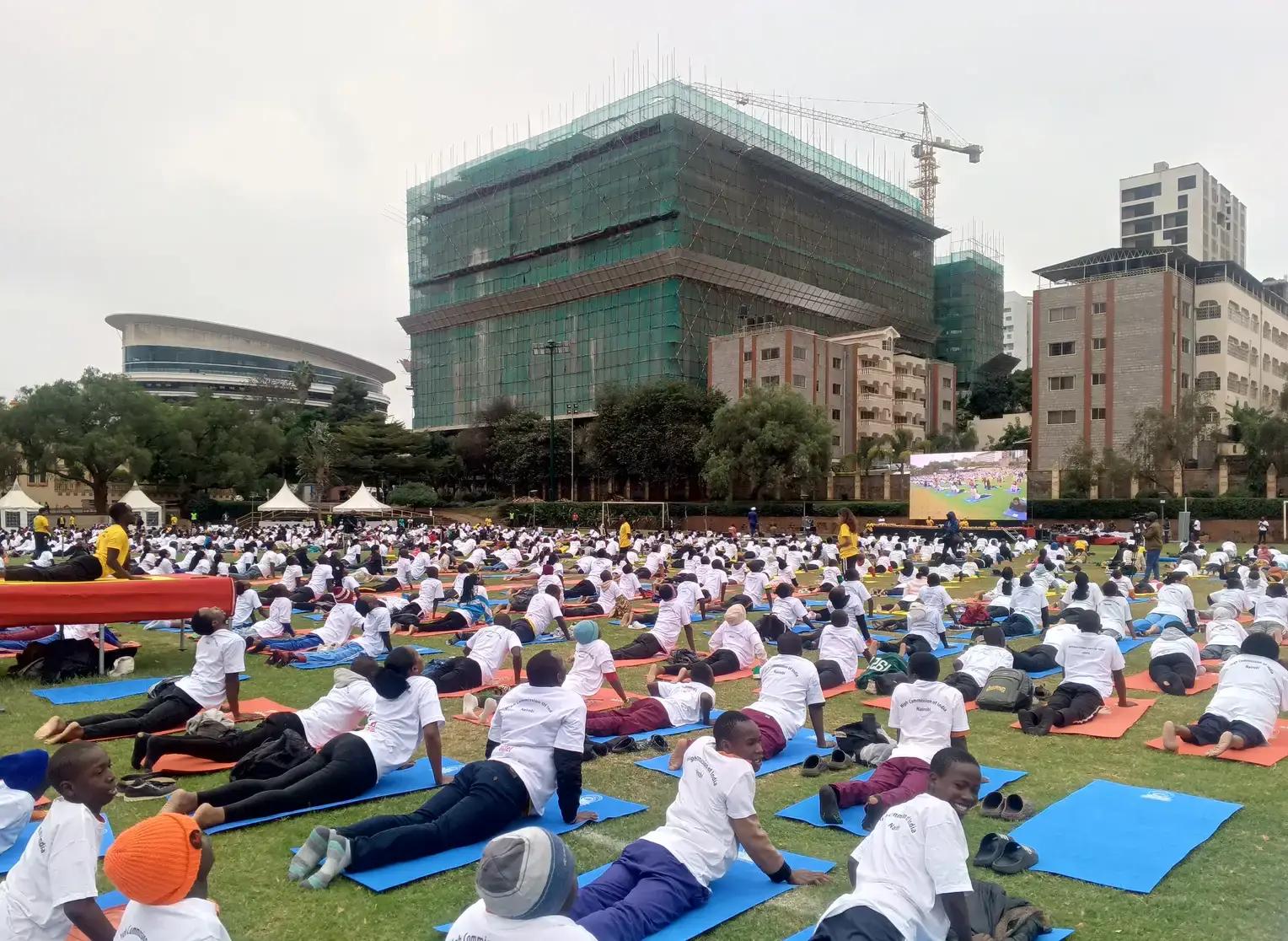 A shared yoga session on the field.