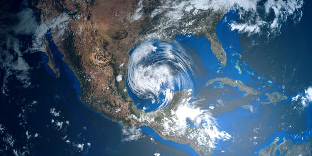 Satellite view of a hurricane swirling over the Gulf of Mexico near North and Central America