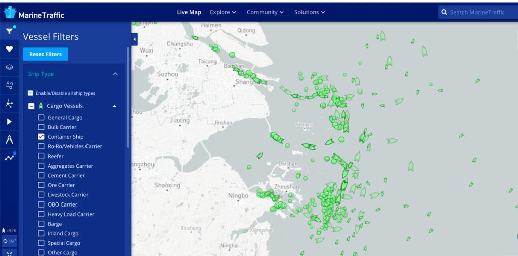 MarineTraffic live map screenshot showing green cargo ship icons clustered around Shanghai and Ningbo