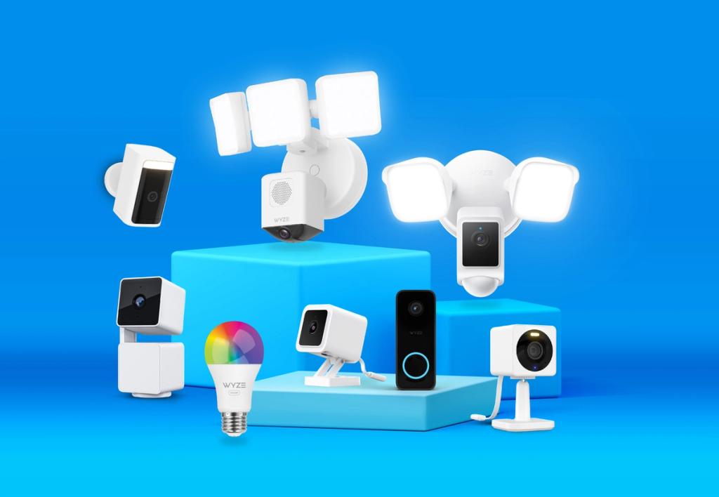 Array of Wyze security cameras, floodlights, doorbell and color bulb on blue blocks against a blue background
