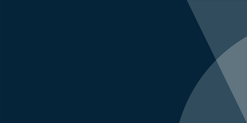 Abstract navy blue background with overlapping translucent circular and arc shapes