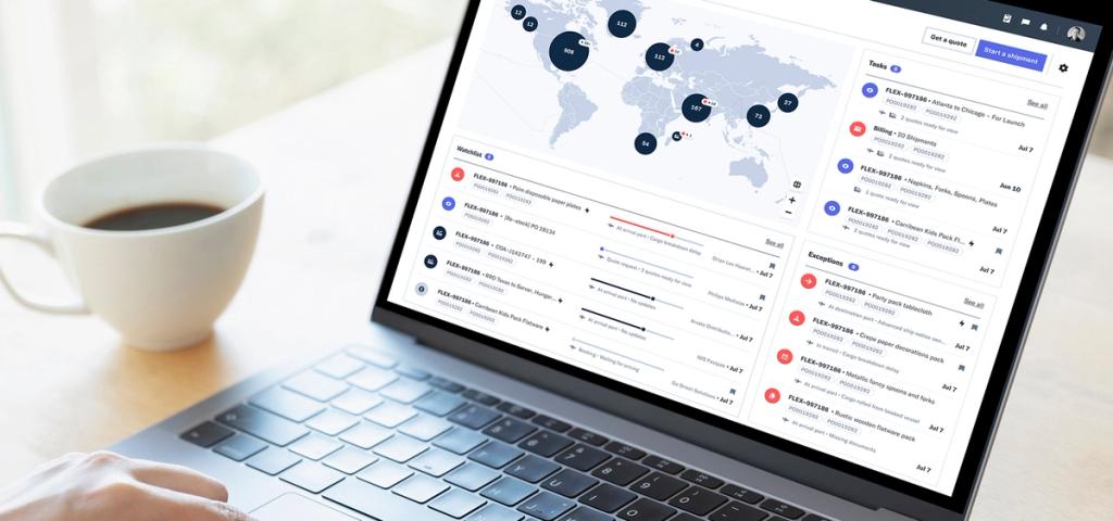 Person working on a laptop showing the Flexport platform dashboard with a world map and shipment tracking, a coffee cup beside it