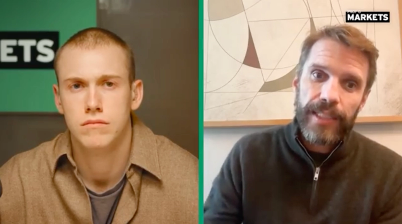 Split-screen Markets TV interview between two men joining remotely from separate locations