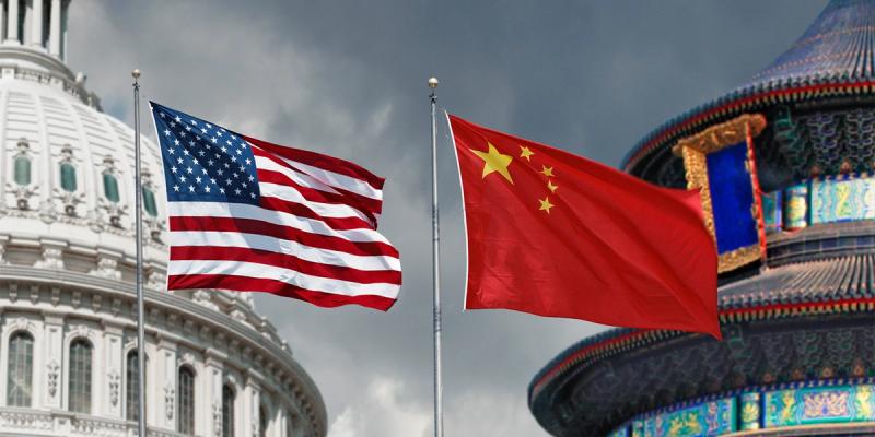 US and Chinese flags flying on poles before the US Capitol dome and a Chinese temple under dark clouds