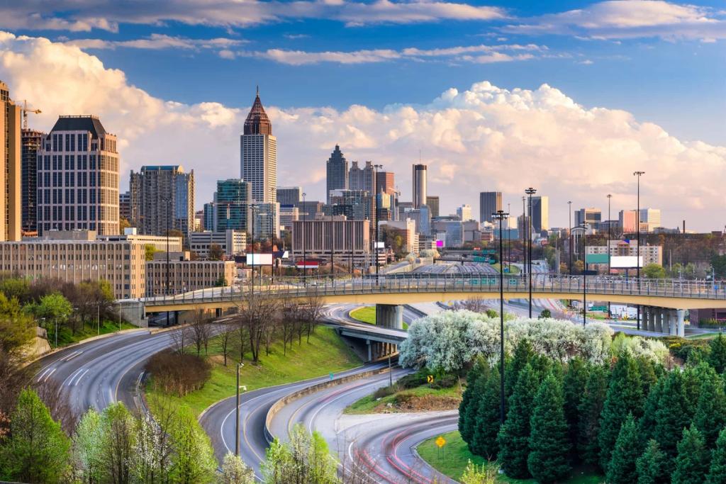 Atlanta skyline with downtown high-rises above curving highways and green trees