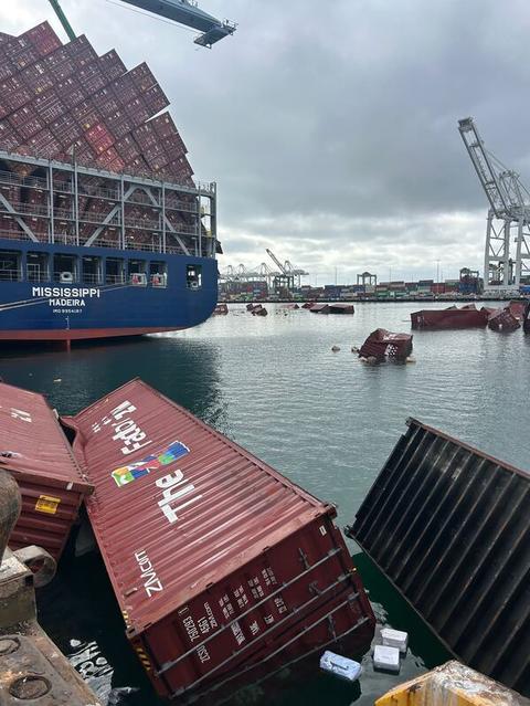 Container ship Mississippi at port with collapsed ZIM and DHL containers floating in the water