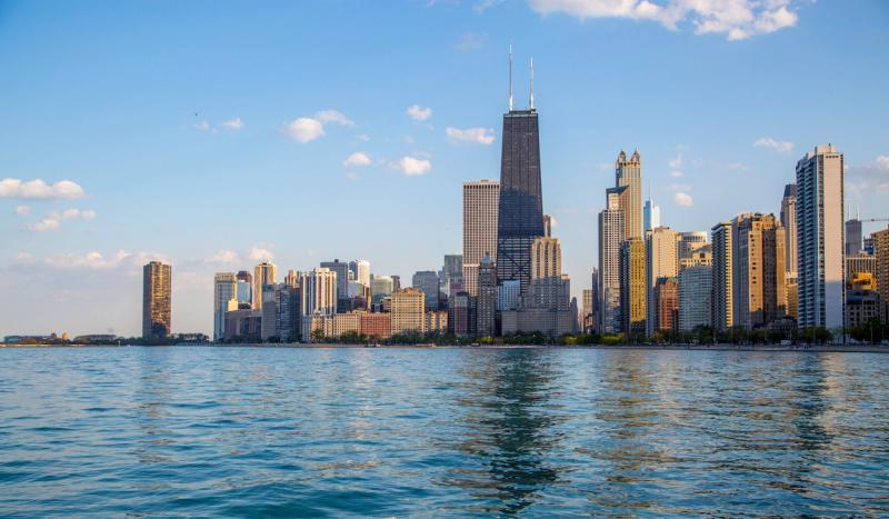 Chicago skyline with skyscrapers along Lake Michigan under a blue sky