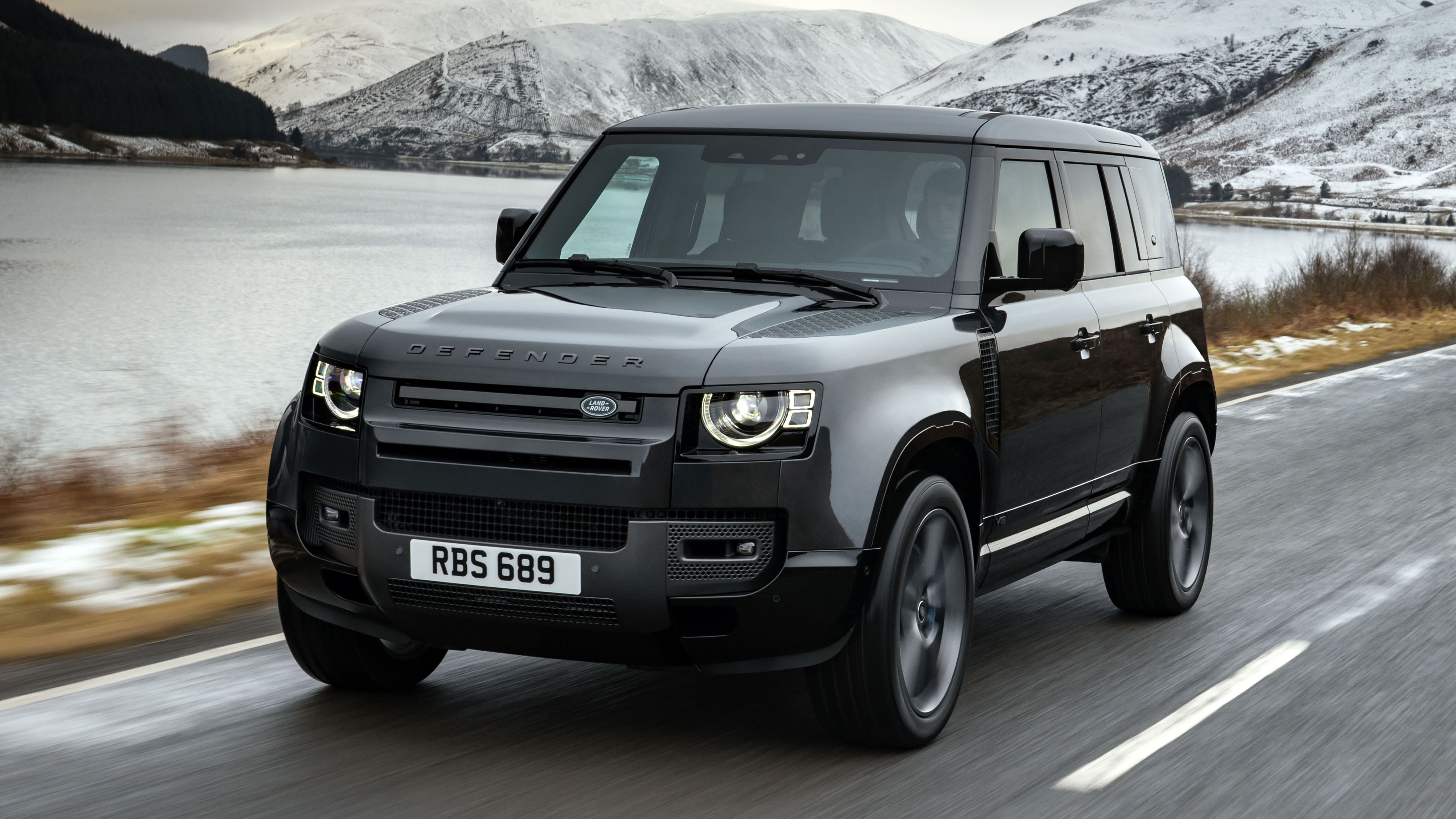 Land Rover Defender front quarter driving