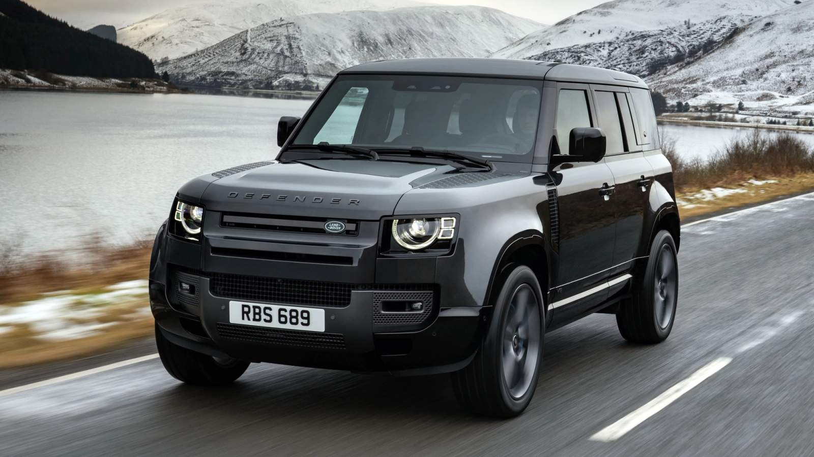 Land Rover Defender front quarter driving