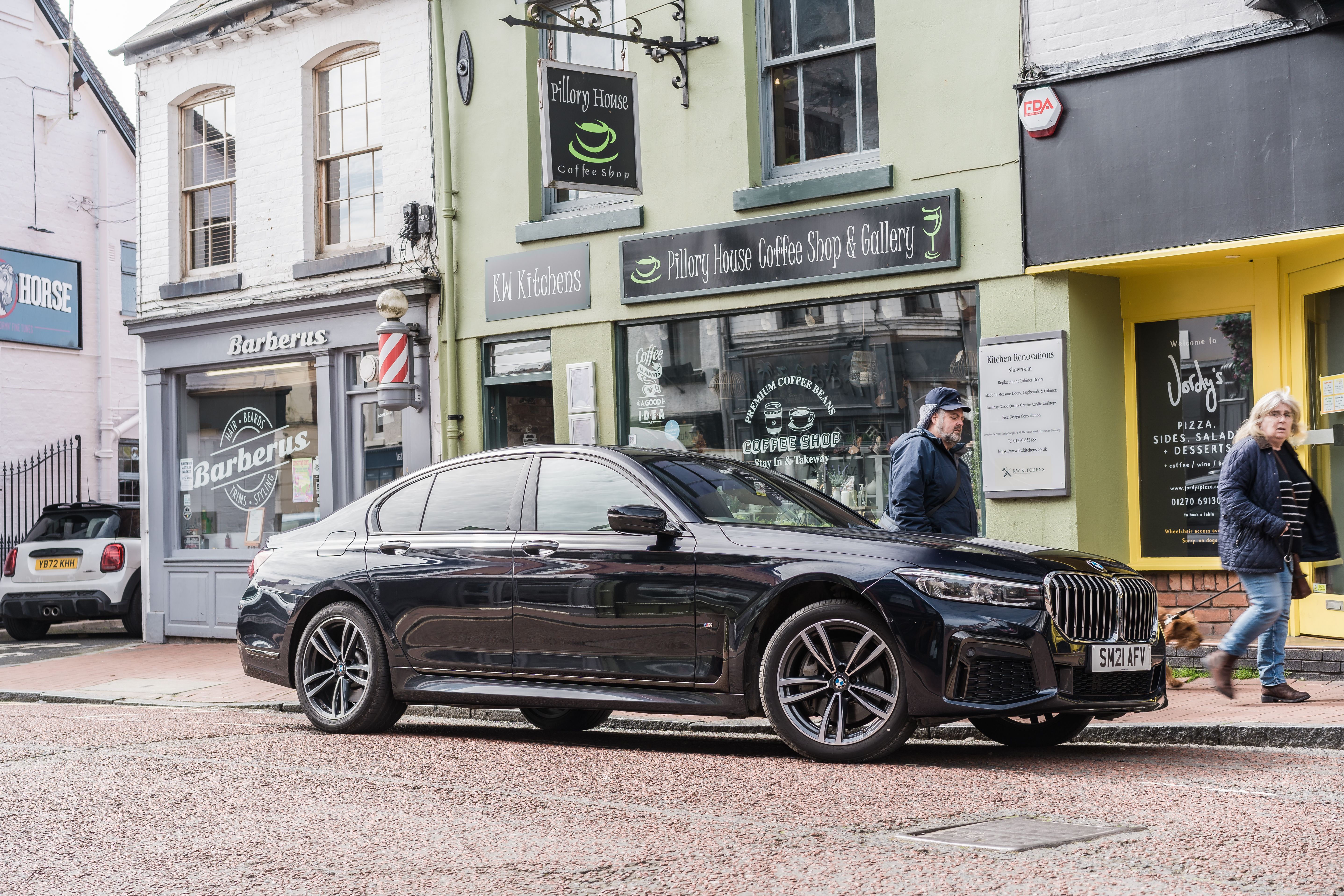 black BMW parked on the street