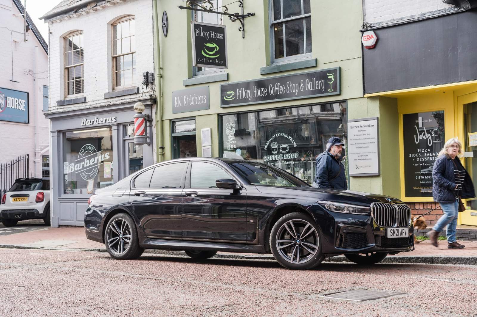 black BMW parked on the street