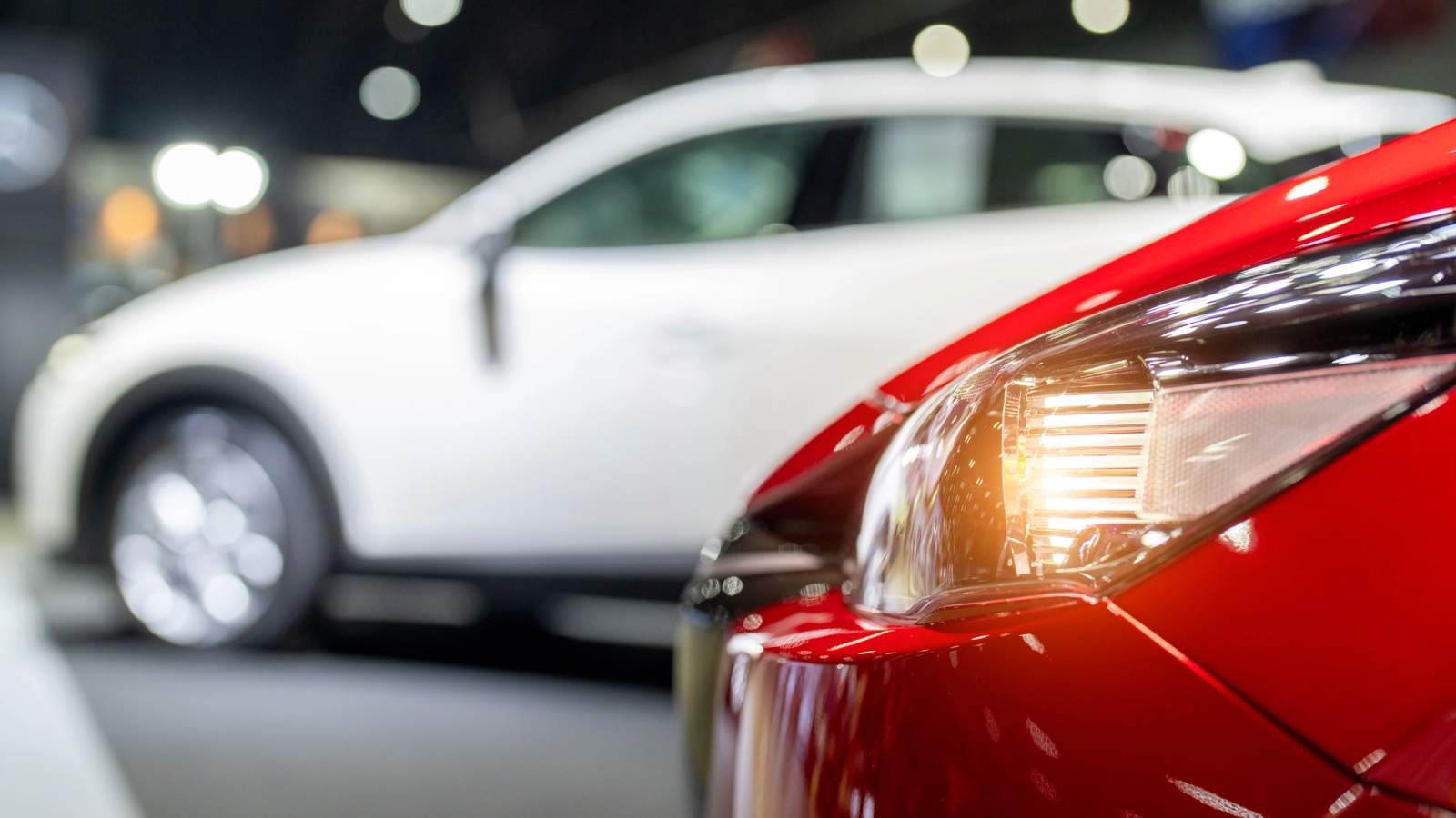 Nearly new white car in a dealership