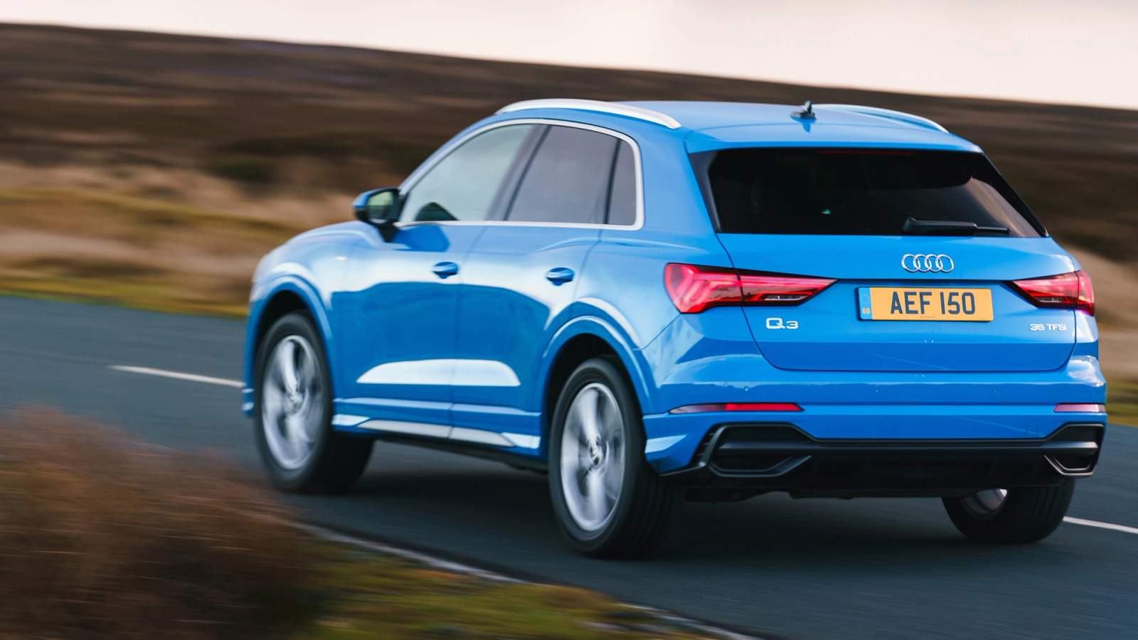 Audi Q3 driving rear