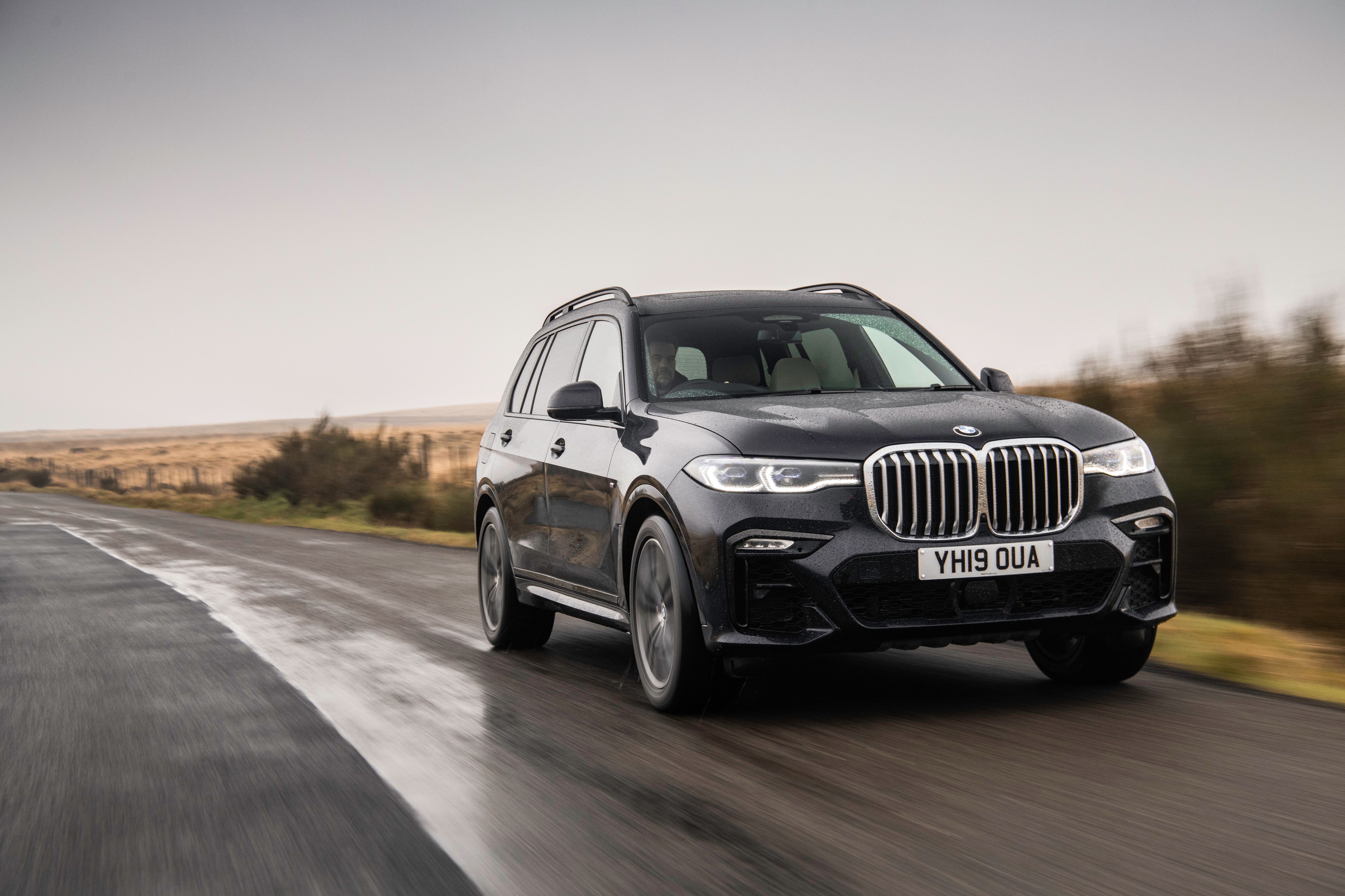 Black BMW X7 driving