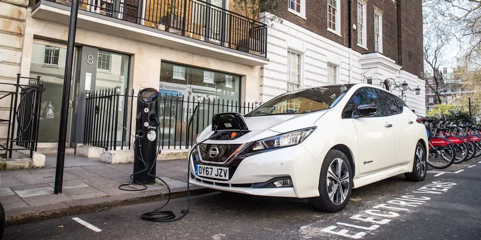 white electric car charging