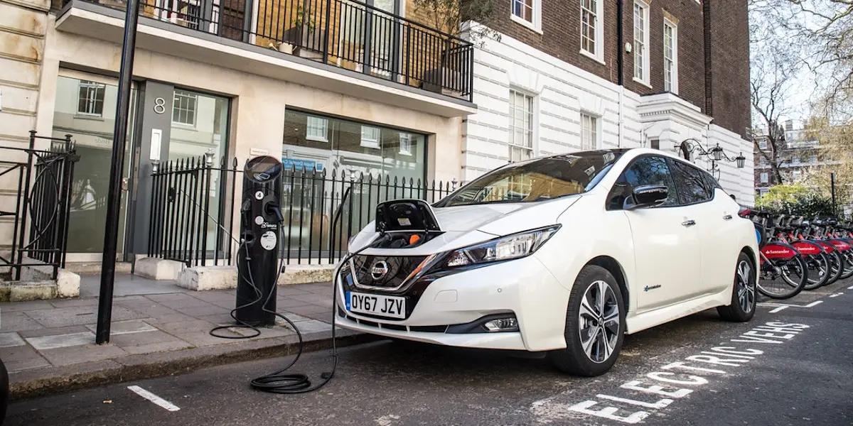 white electric car charging