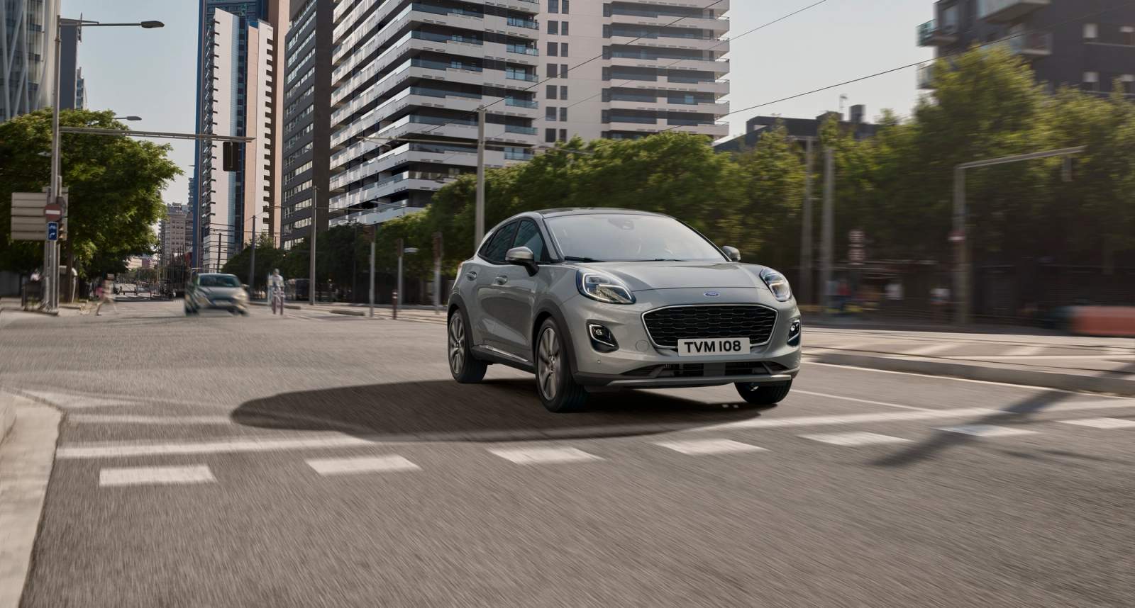 Grey Ford Puma driving