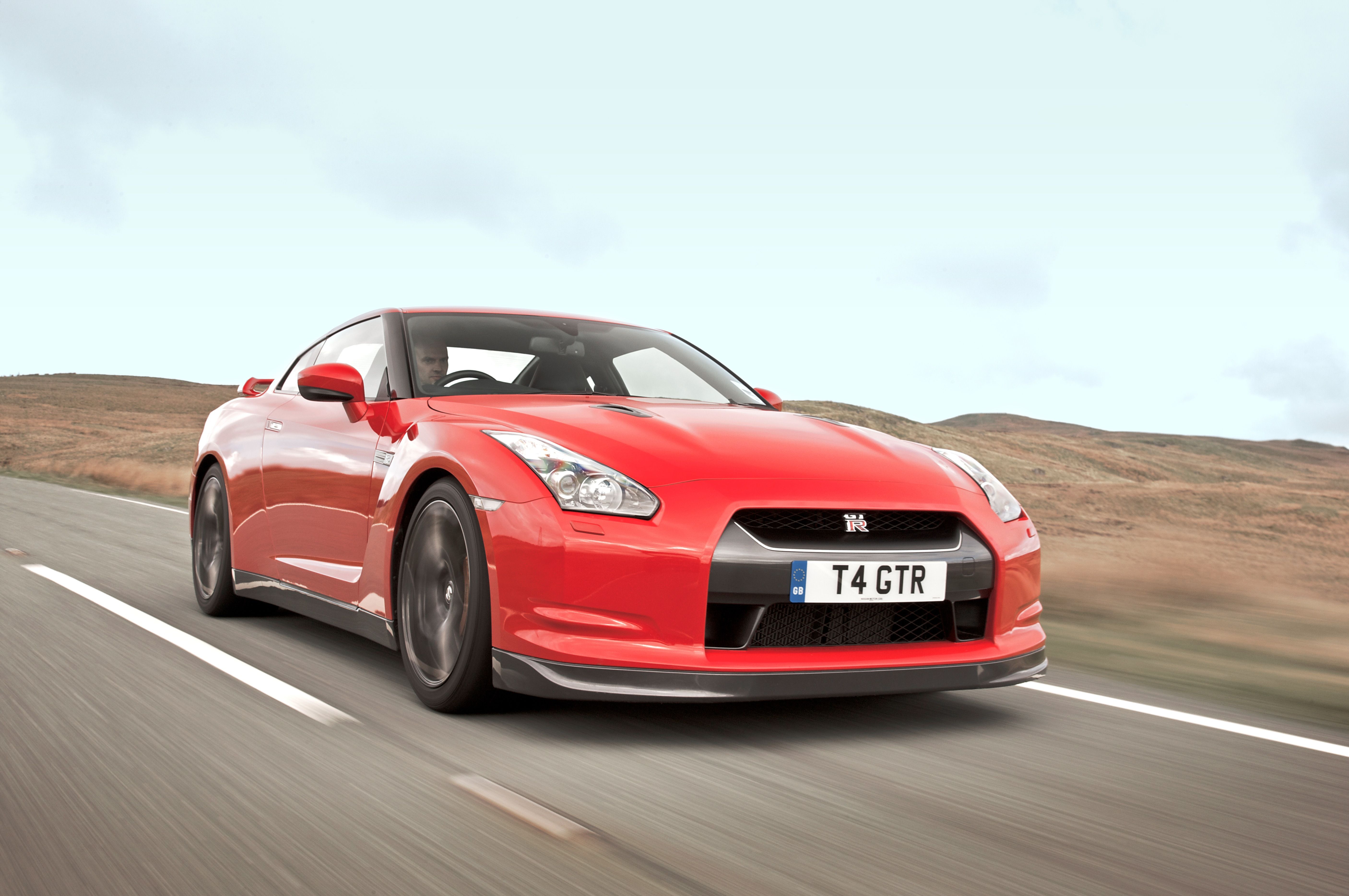Red Nissan GT-R driving