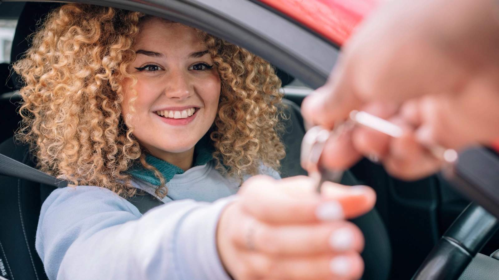 Woman handed car keys