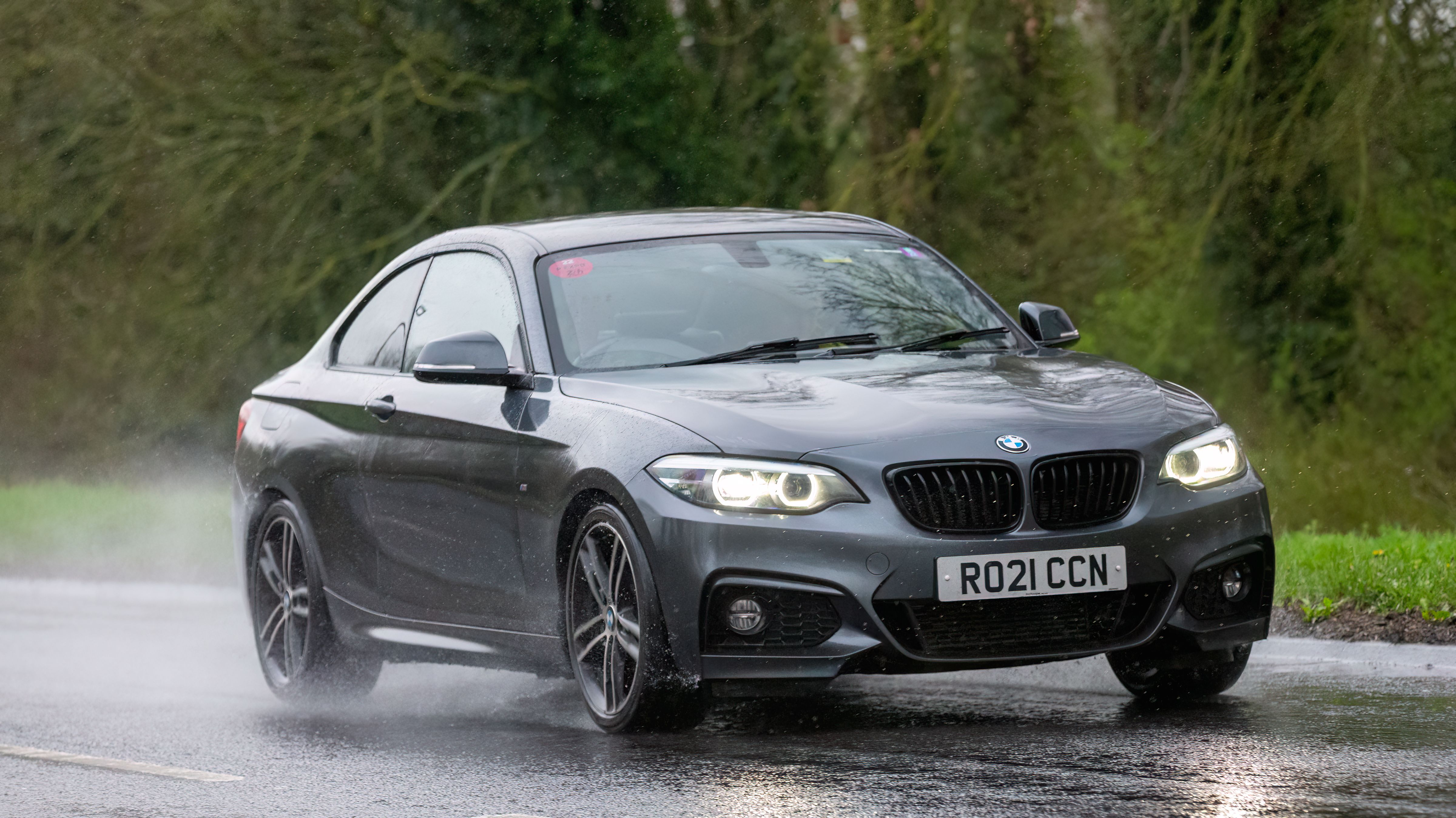 Car on the road in rainy day