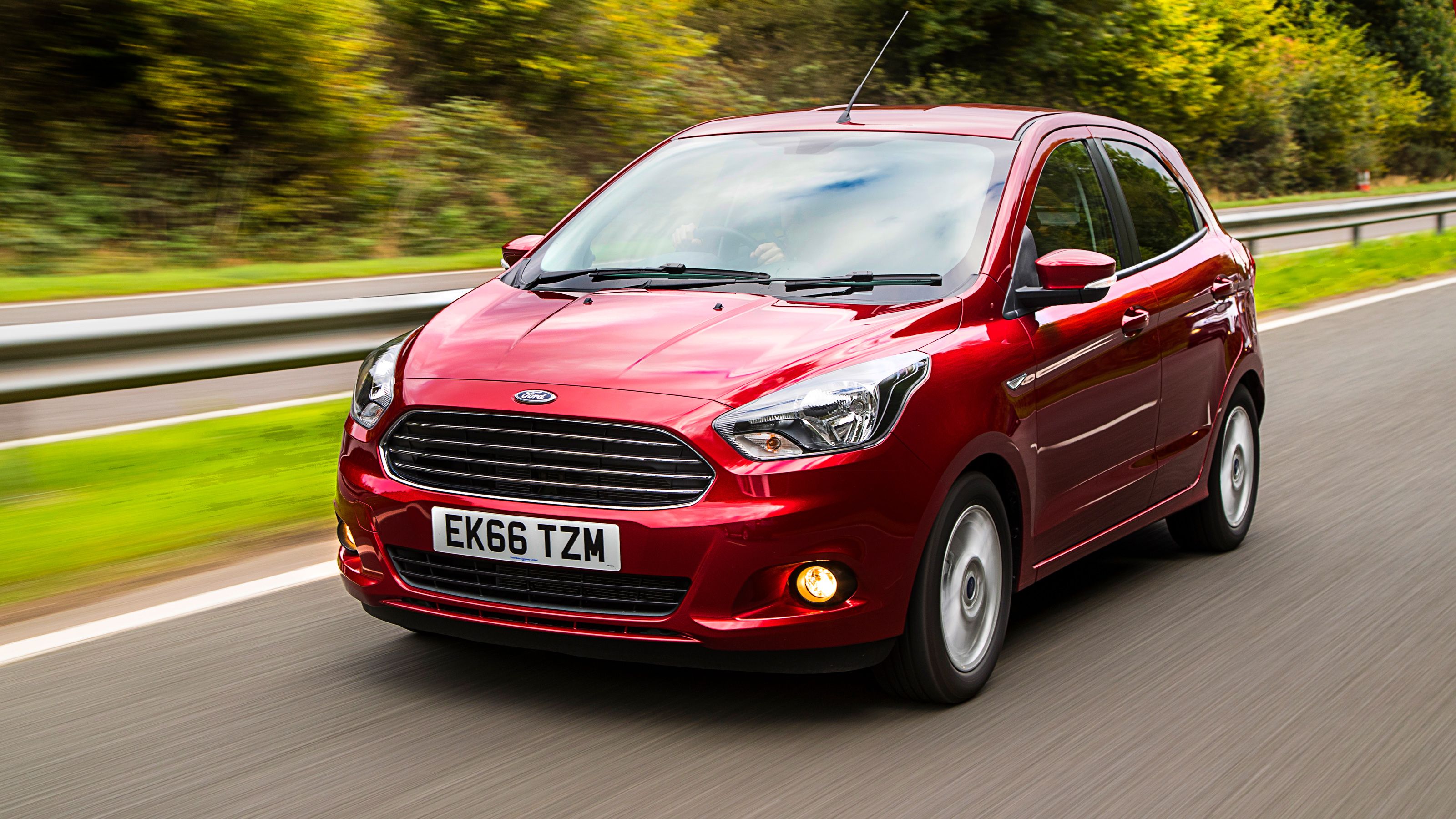 Red Ford Ka+ front driving