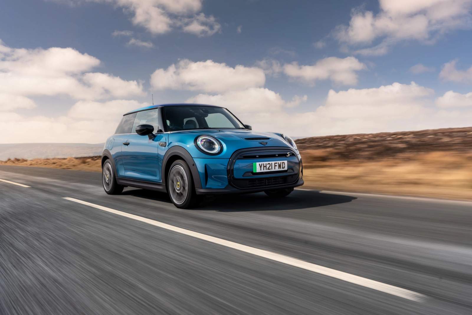 blue car on road