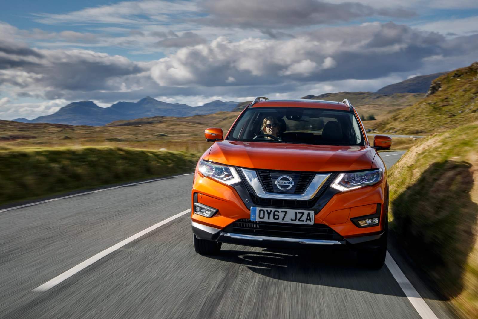 orange car on road