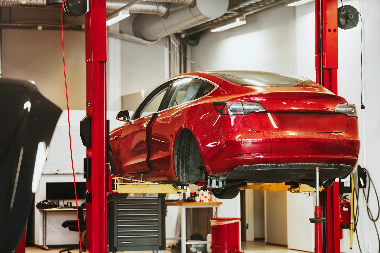 Tesla Model 3 on an inspection lift