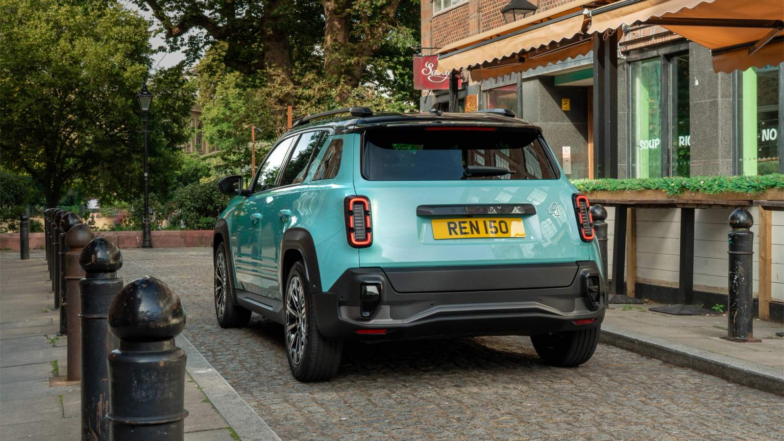 Renault 4 E-Tech parked on a cobbled street