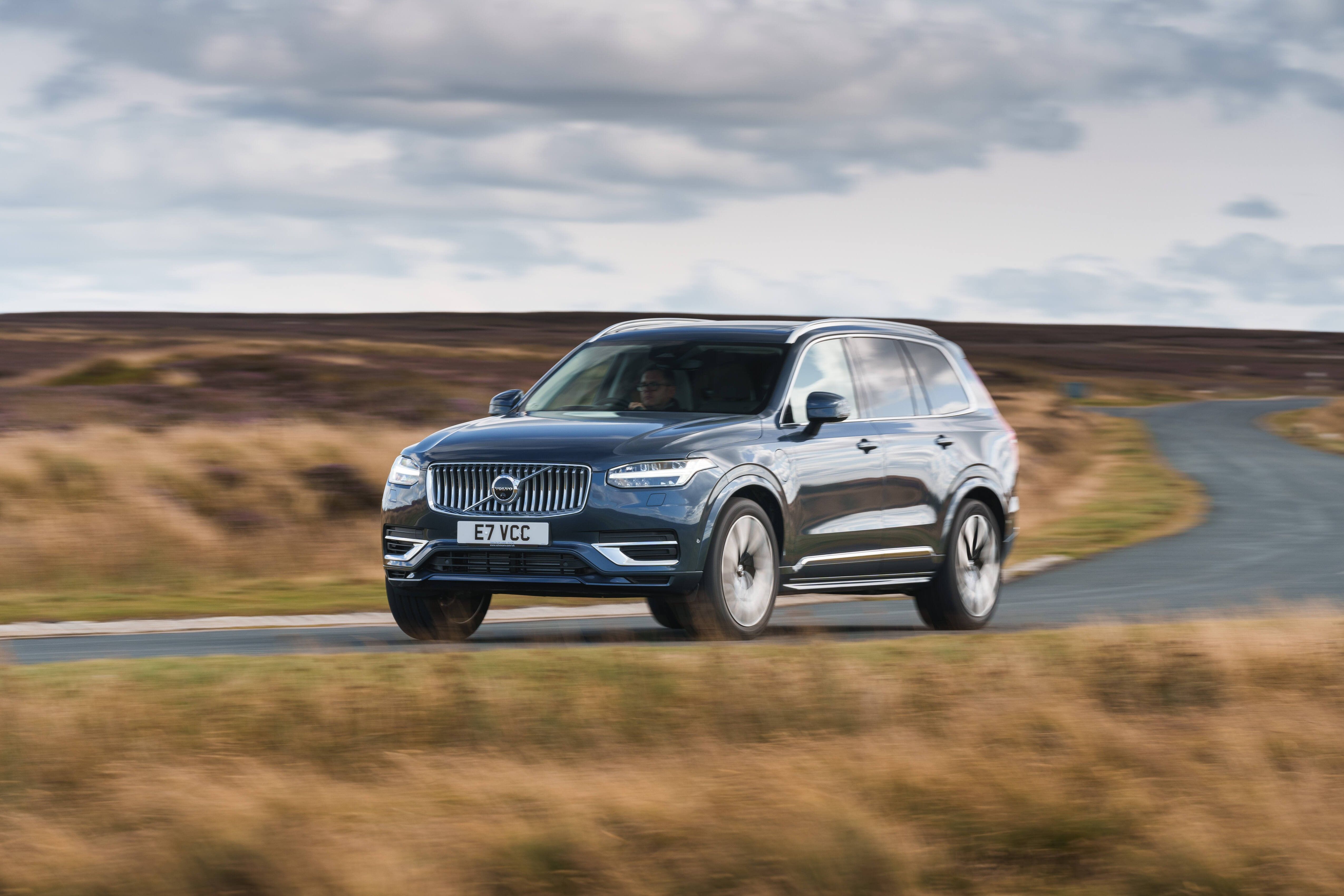 Blue Volvo XC90 driving