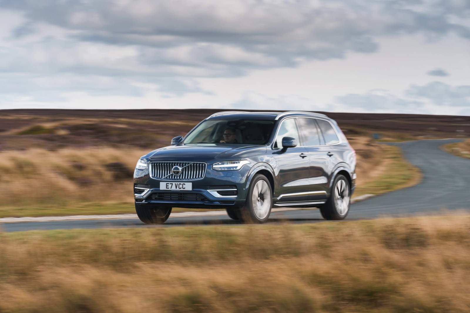 Blue Volvo XC90 driving