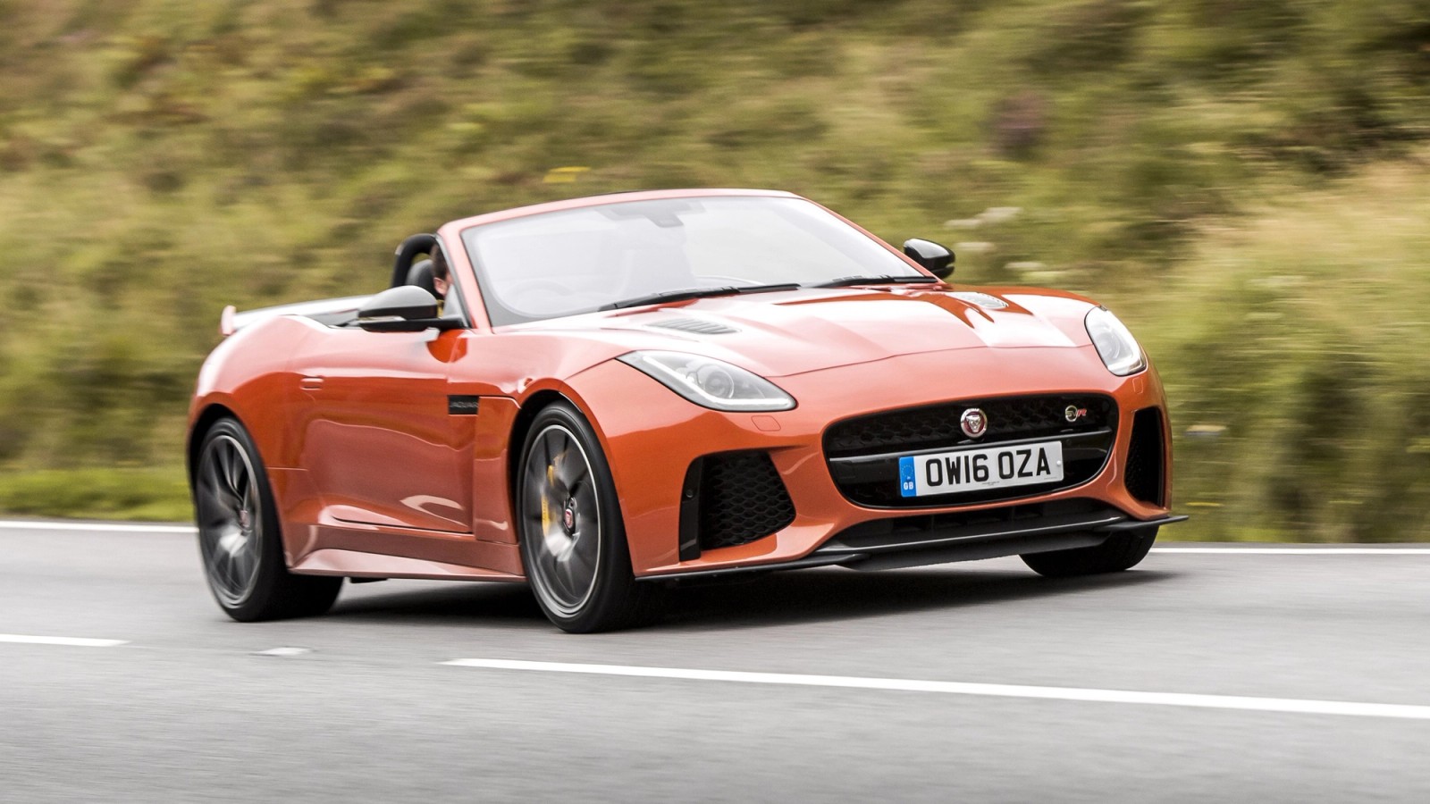 Orange Jaguar F-Type SVR front driving