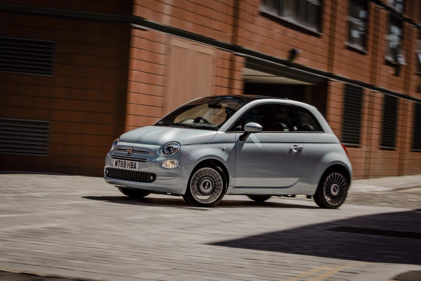 Grey Fiat 500 driving