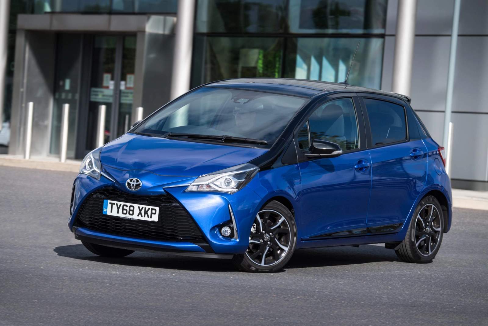 parked blue toyota yaris 