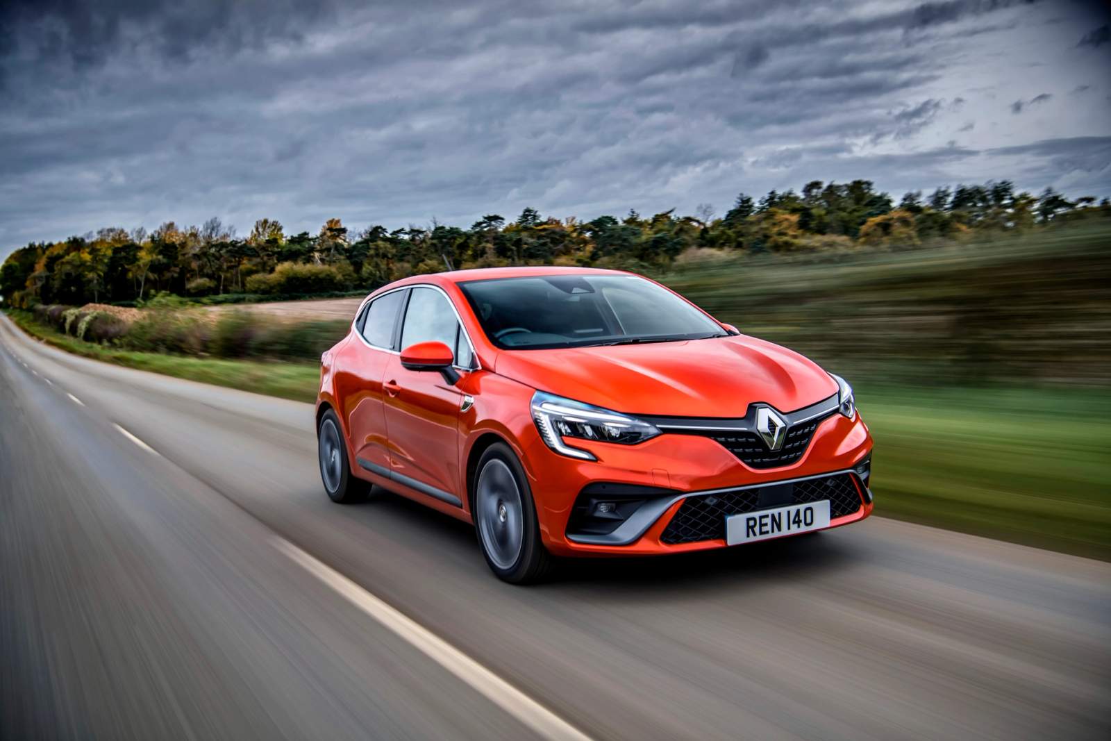 orange car on road