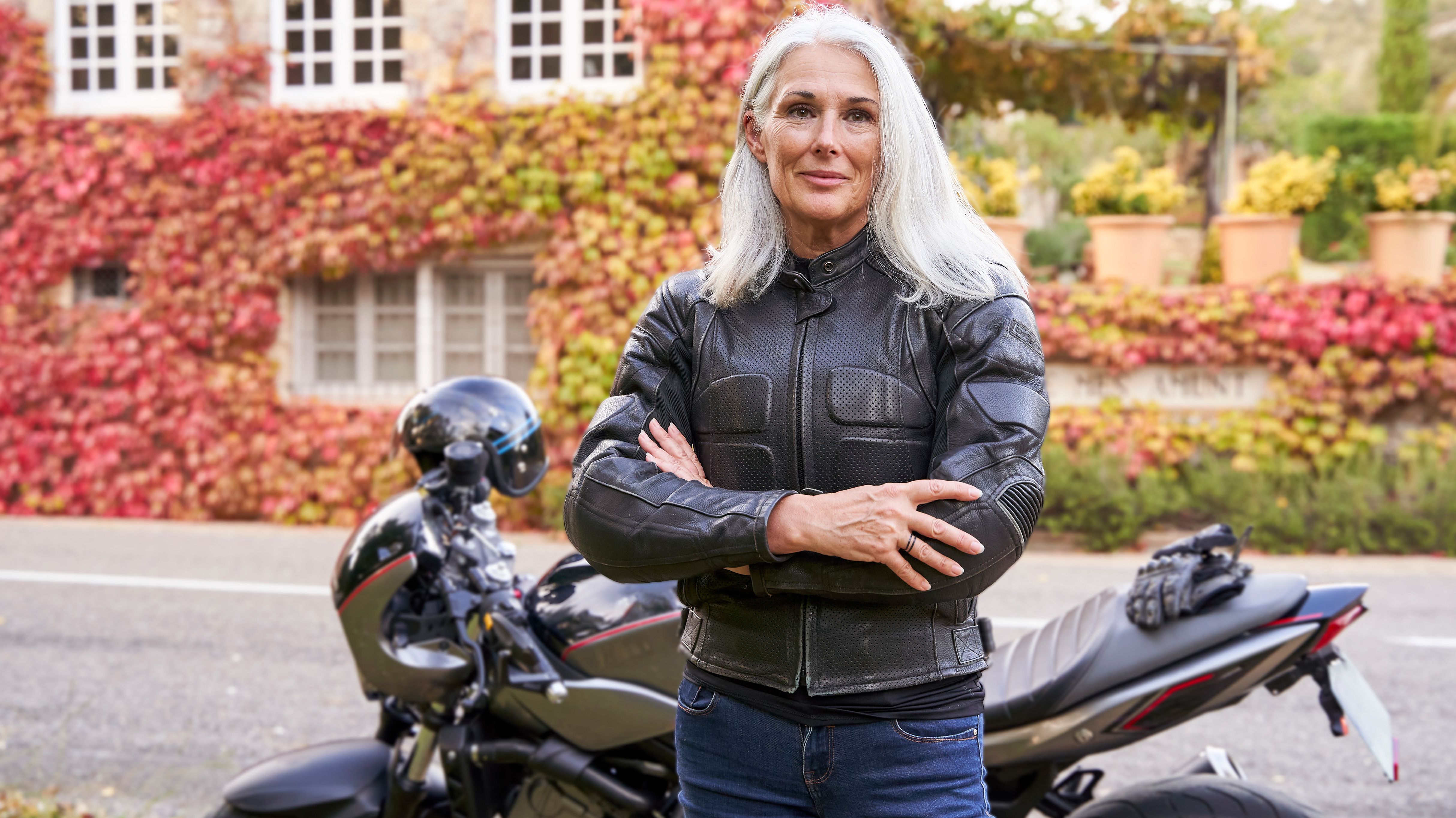 Lady posing in motorbike jacket